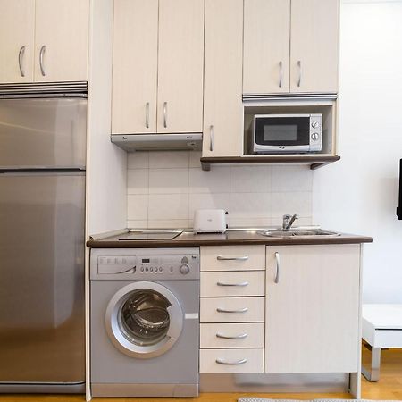 Apartamentos Gran Via Madrid Bagian luar foto