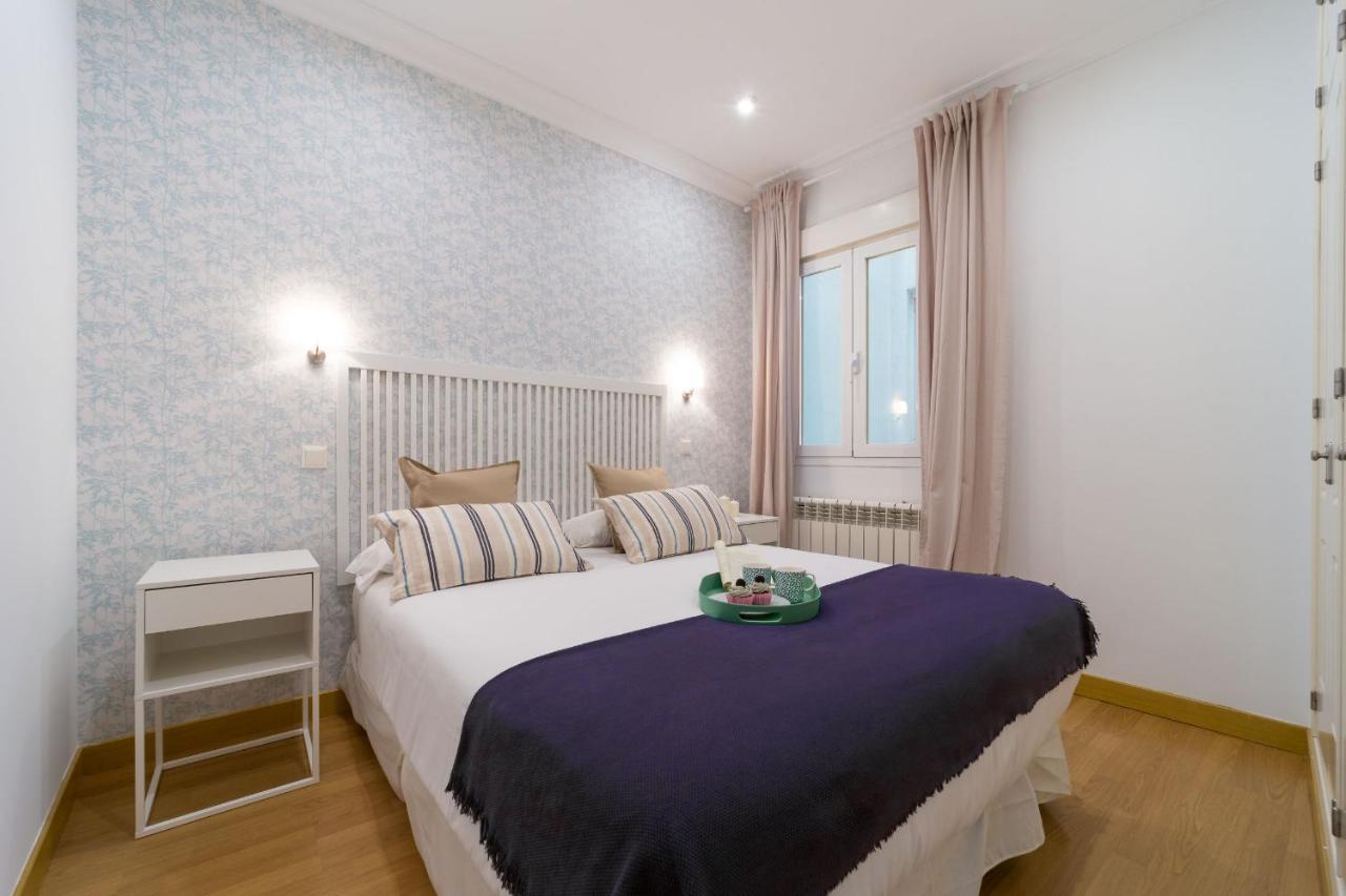Apartamentos Gran Via Madrid Bagian luar foto