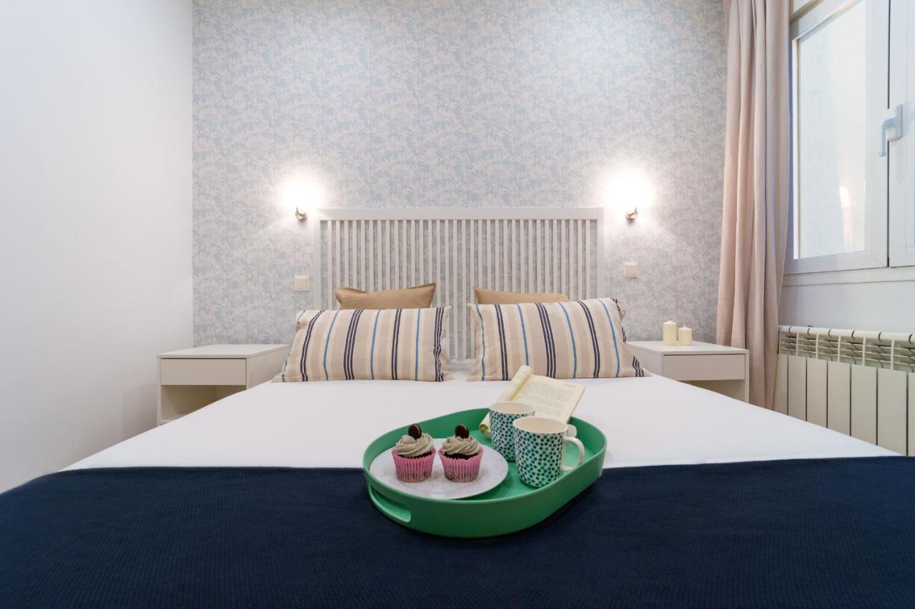 Apartamentos Gran Via Madrid Bagian luar foto