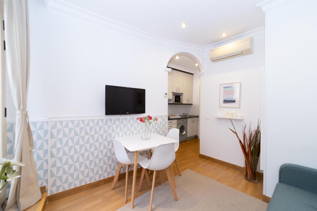 Apartamentos Gran Via Madrid Bagian luar foto